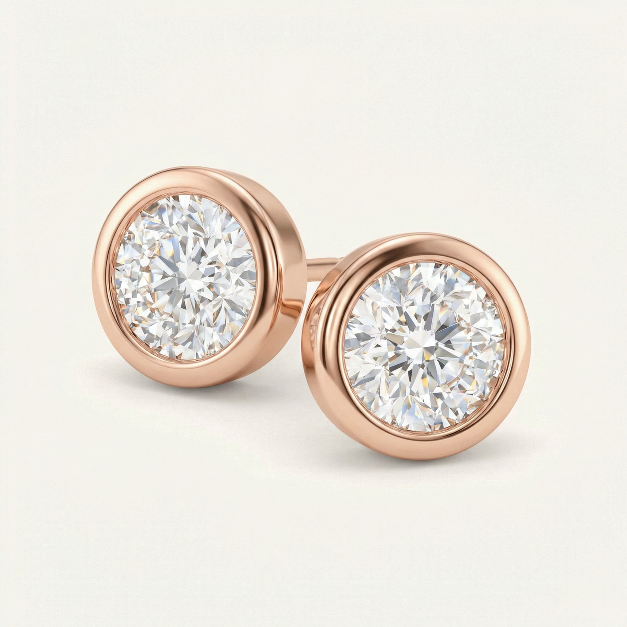 0.5CT BEZEL-SET SOLITAIRE STUD EARRING